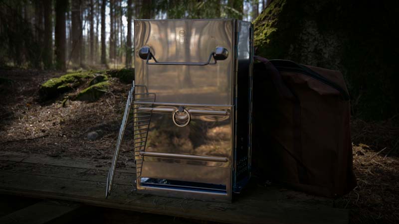Eldlåda Bushen med grillgaller i skogen